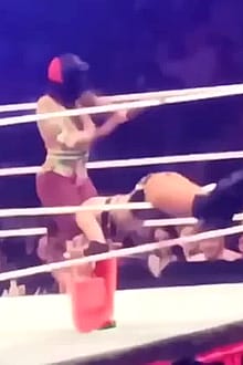 Dakota Kai spanked over the rope'